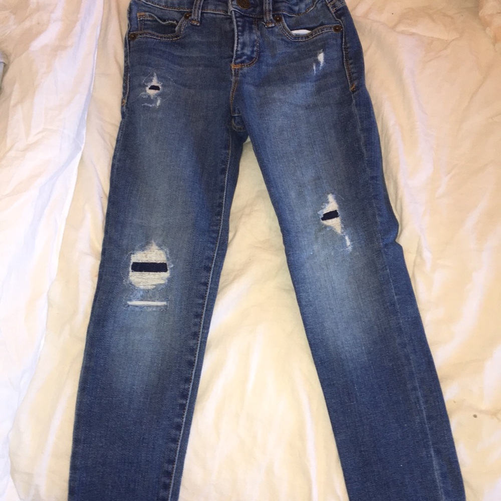 Girls ripped jeans